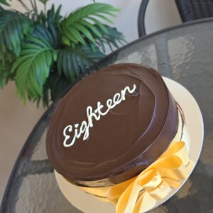 Cake Writing and Ribbon